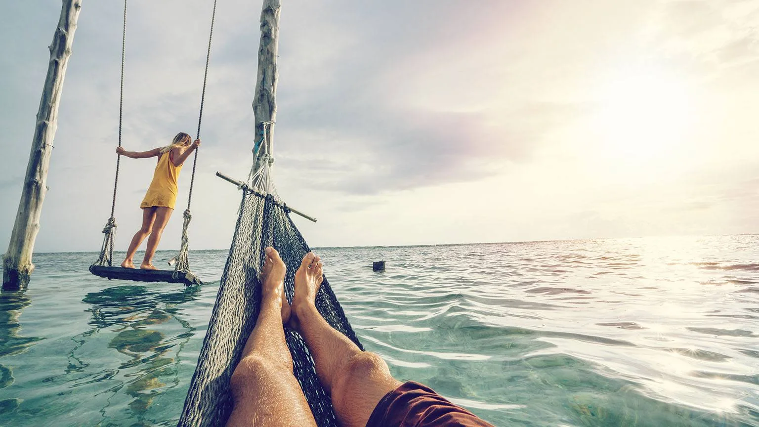 Image: Getty Images Swinging on the beach
