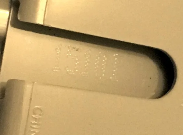 This is the code you want to look for. Yes, they can be very hard to see (and our iPad adaptor clearly is one of the potentially dodgy ones)