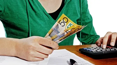 Counting Australian money calculator papers Counting Australian money calculator papers