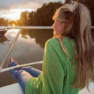 Woman sitting on a boat