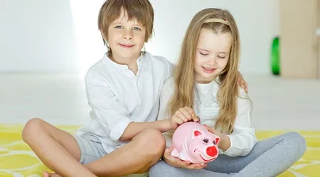 boys girls saving piggybank money boys girls saving piggybank money