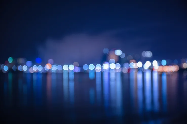city skyline water blurry