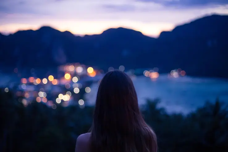 girl staring into the mountains