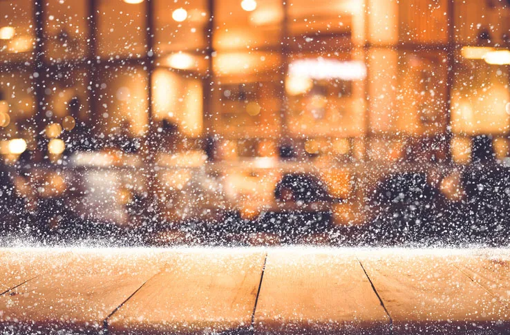 snow falling on a table