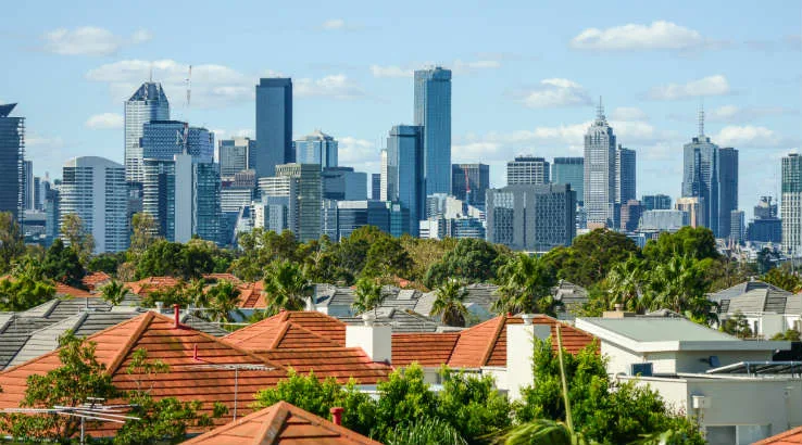 Melbourne_Sky_shutterstock_402472060 Skyscrapers and houses in the city.