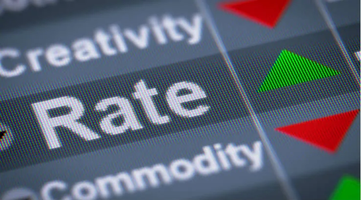 Interest_Rates_738shutterstock_533046742 The word Rate and a green arrow.