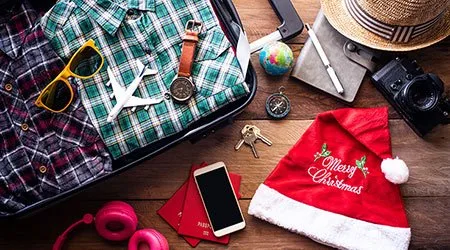 christmas-luggageshutterstock_1225468303-450 christmas-luggageshutterstock_1225468303-450