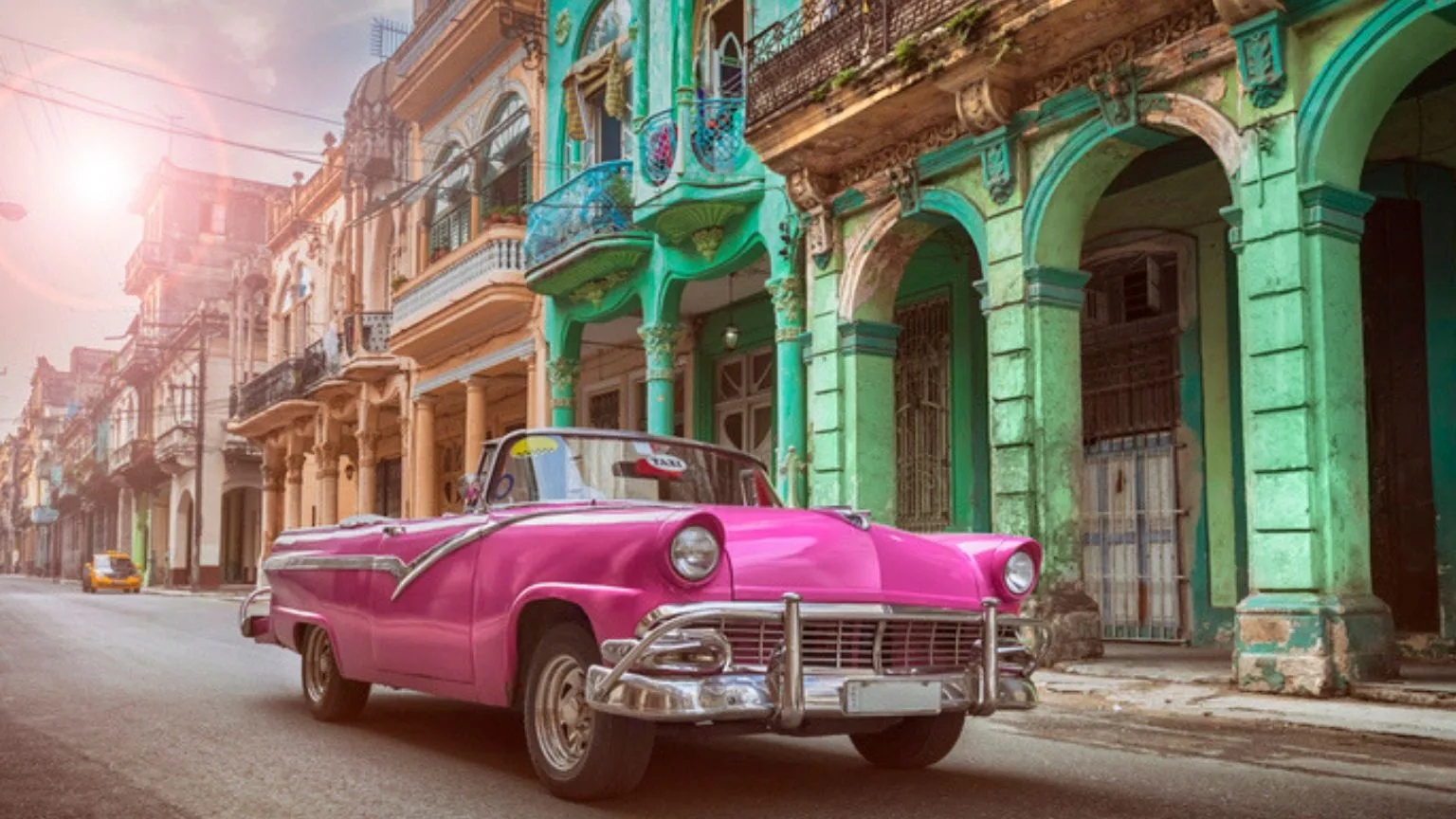 Image: Getty Images Vintage pink convertible in Havana, Cuba