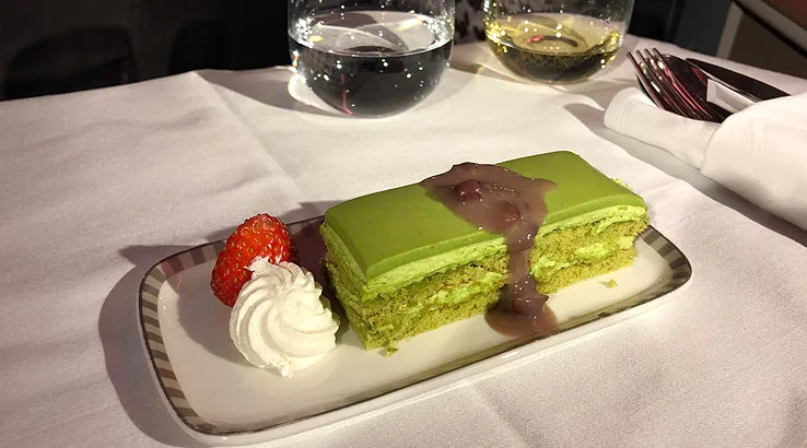 Image: Shing Kam/Finder Green tea chocolate cake served with red bean and fresh berries