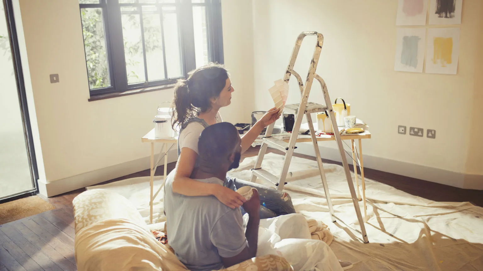Image: Getty Images young couple on house renovation