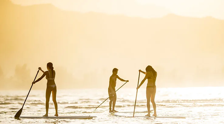 Friends on stand up paddleboards (SUP) Friends on stand up paddleboards (SUP)