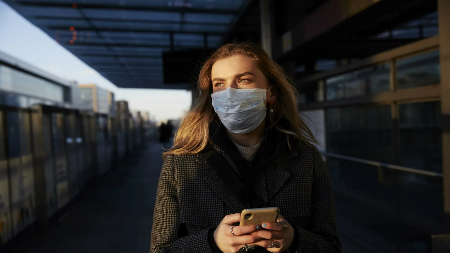 Image: Getty Images Woman in face mask