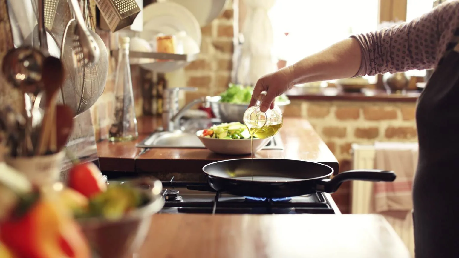 Image: Getty Images cooking vegetables in real, rustic kitchen. Natural light, short DOF, a little bit noisy.