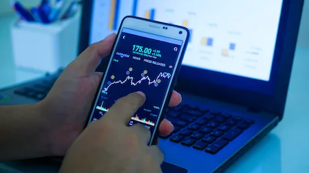 What is a stock split and how does it impact prices?