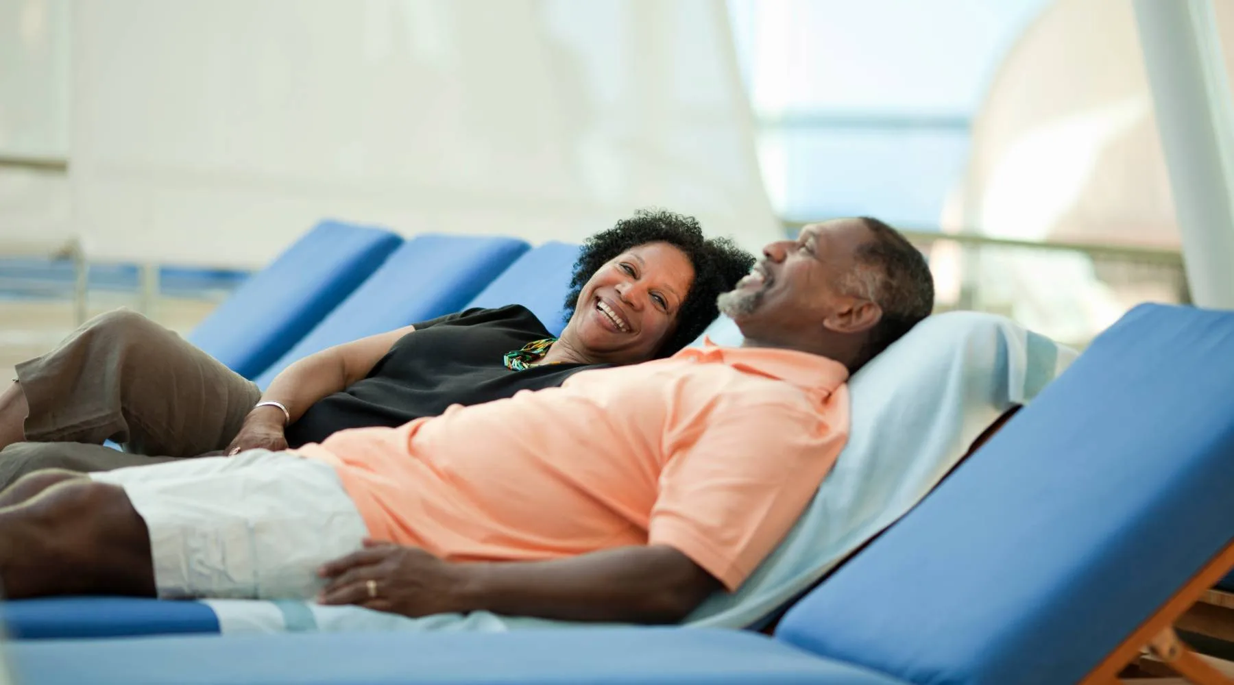 Coupleoncruisedeckchair_GettyImages_1800x1000 Coupleoncruisedeckchair_GettyImages_1800x1000