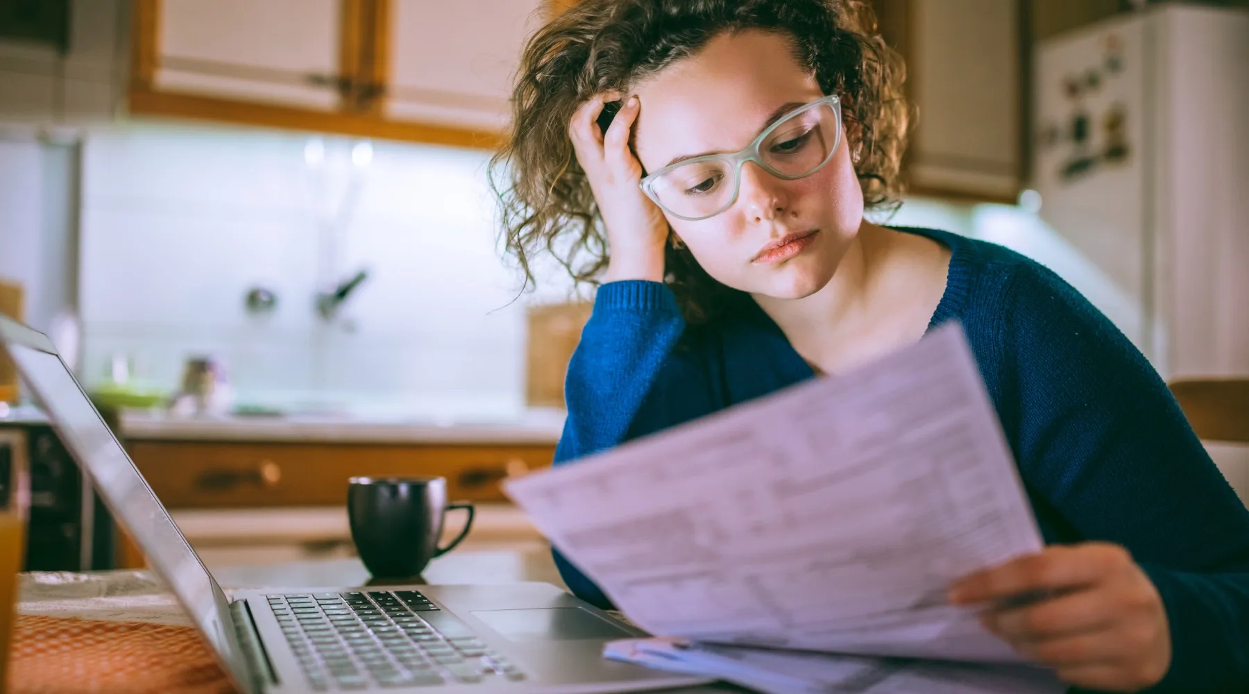 WomanReviewingFinances_GettyImages_1800x1000 (1) WomanReviewingFinances_GettyImages_1800x1000 (1)