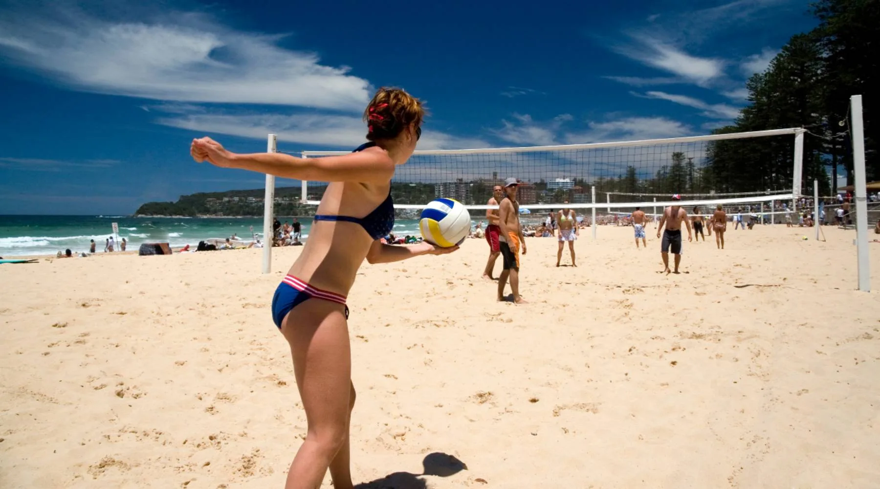 WomanplayingbeachvolleyballManly_GettyImages_1800x1000 WomanplayingbeachvolleyballManly_GettyImages_1800x1000