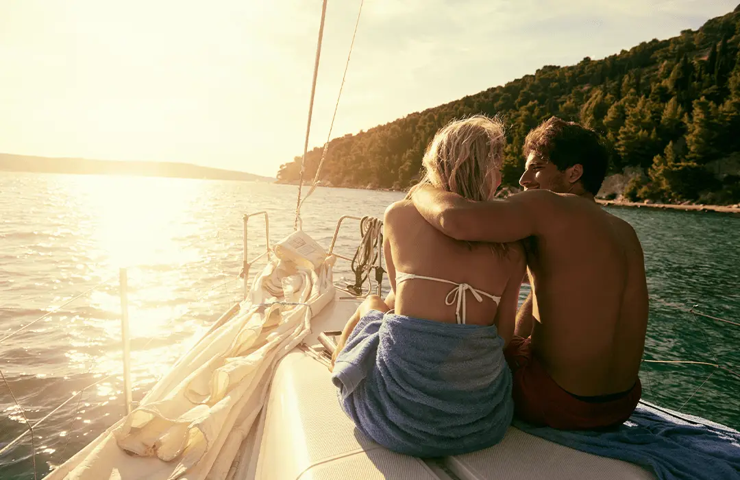 Image: Getty Images couple on ship during sunset