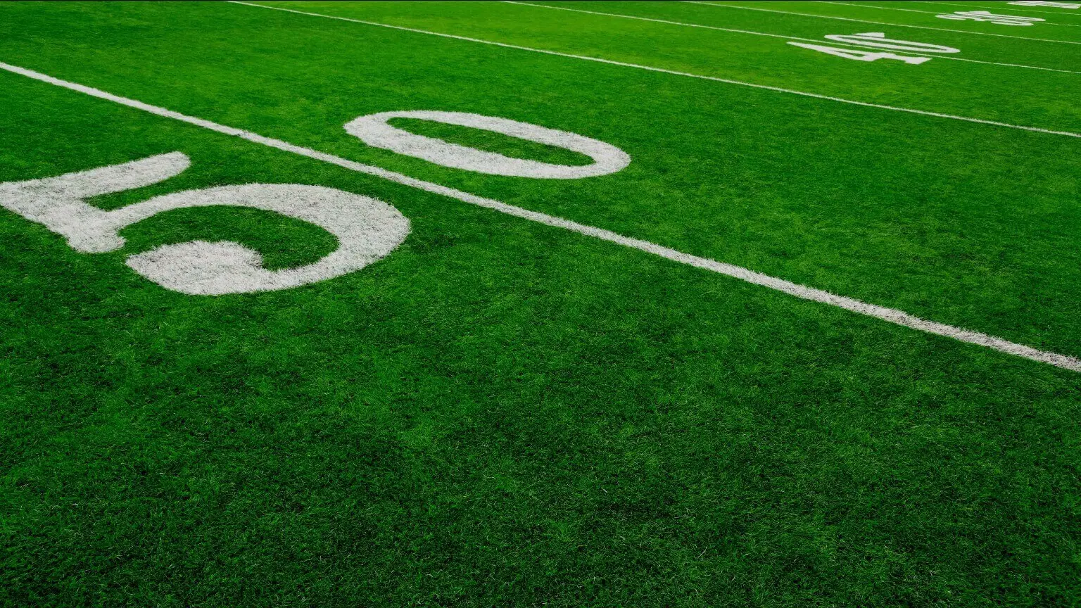 Image: Shutterstock Green football field