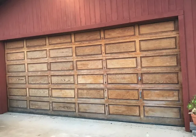 Before photo of garage door before $100 update