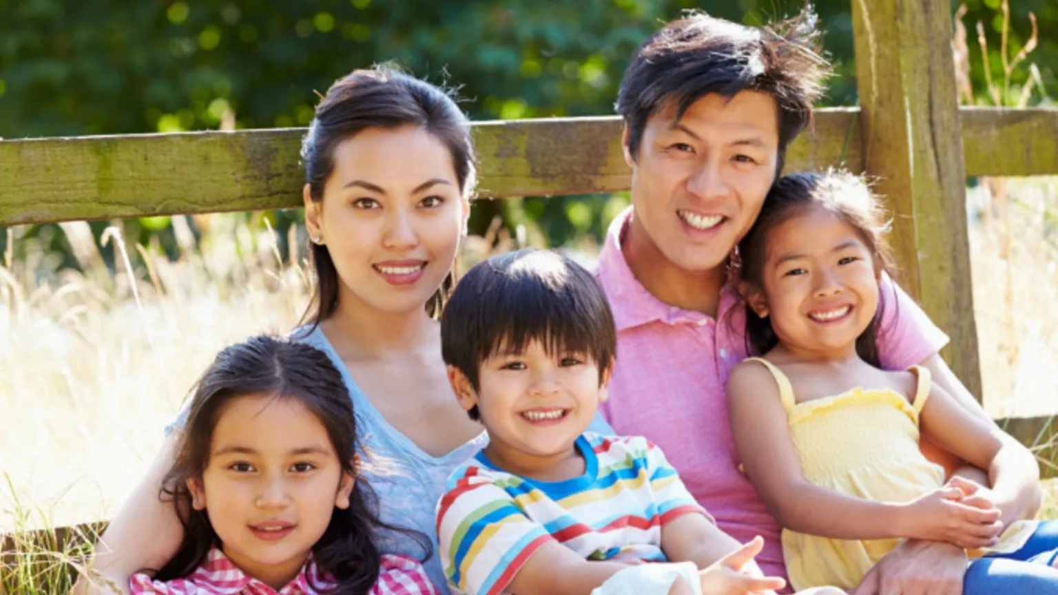 Image: Shutterstock A family photo with three kids