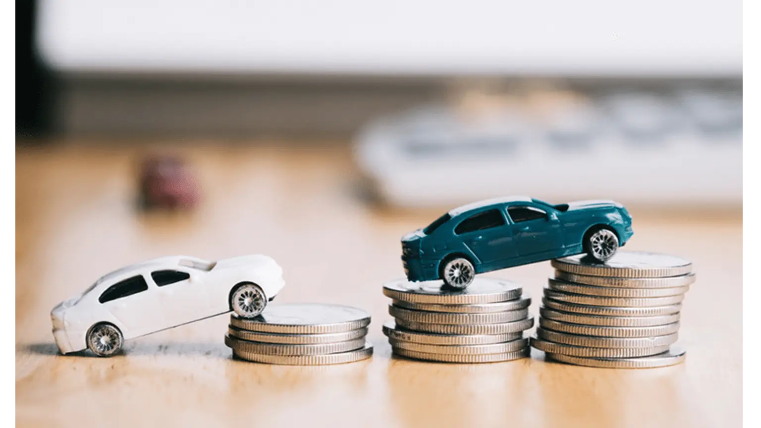 Image: Getty Images Toy cars on top of coins