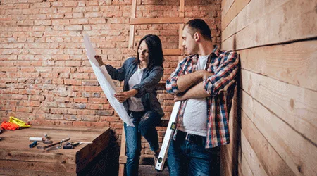 man and woman planning for renovation