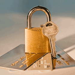 Image: Getty Images Lock and key on credit cards
