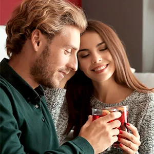 Couple drinking wine at home