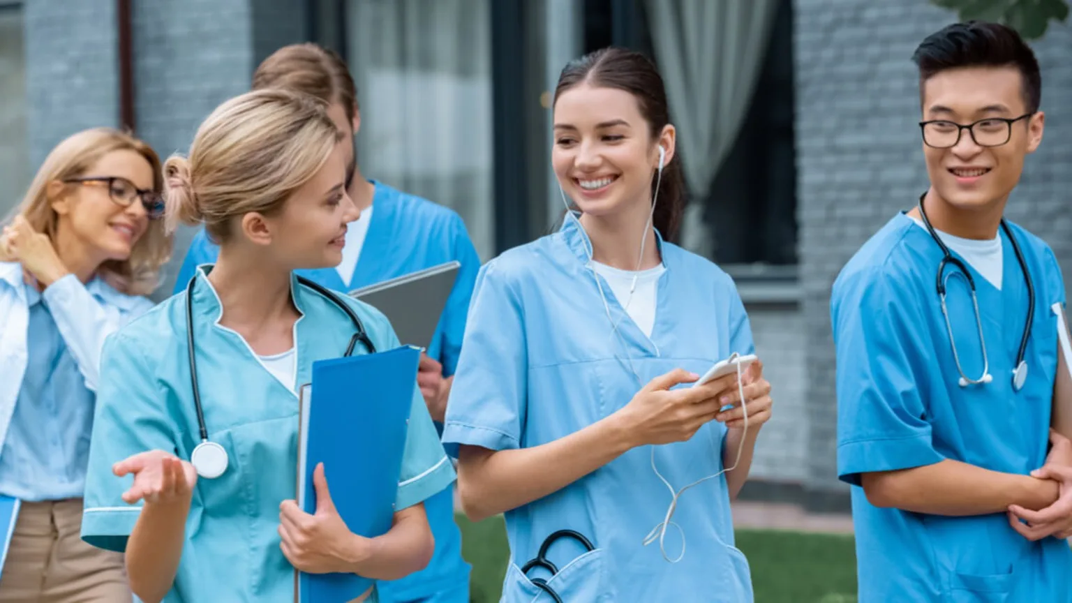 Image: Shutterstock doctors having a chat with smiles