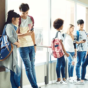 Image: Getty Images Students with a cellphone Image: Getty Images
