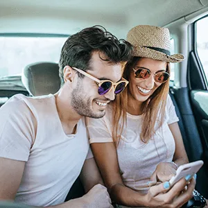 Image: Getty Images Travellers looking a cellphone Image: Getty Images