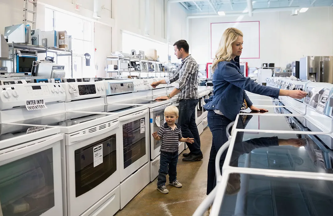 Image: Getty Images Family shopping for appliances