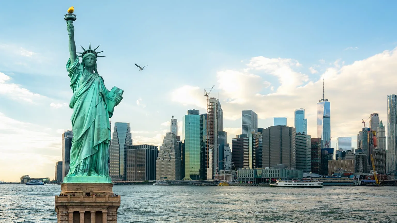 Image: Getty Images The Statue of Liberty with Manhattan in New York City, USA