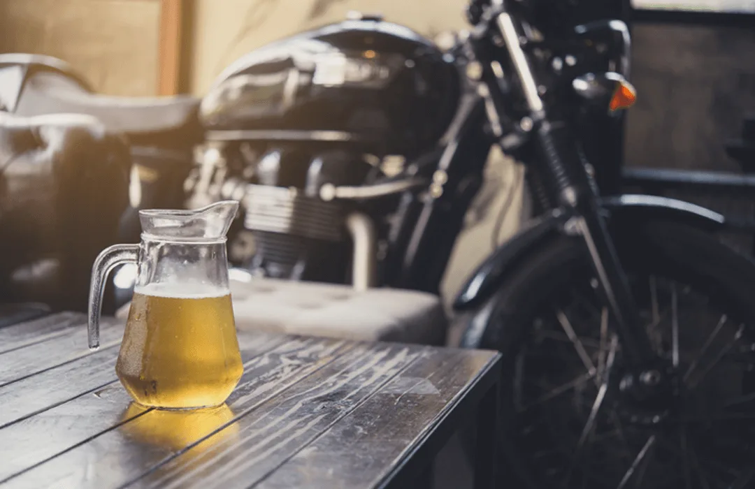Image: Getty Images Black motorcycle and beer