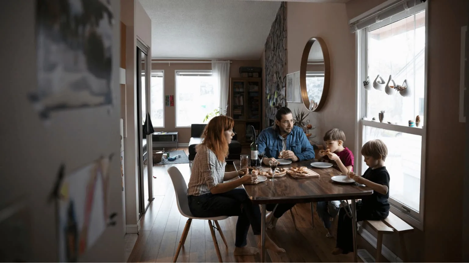 Image: Getty Images Family having lunch with their children