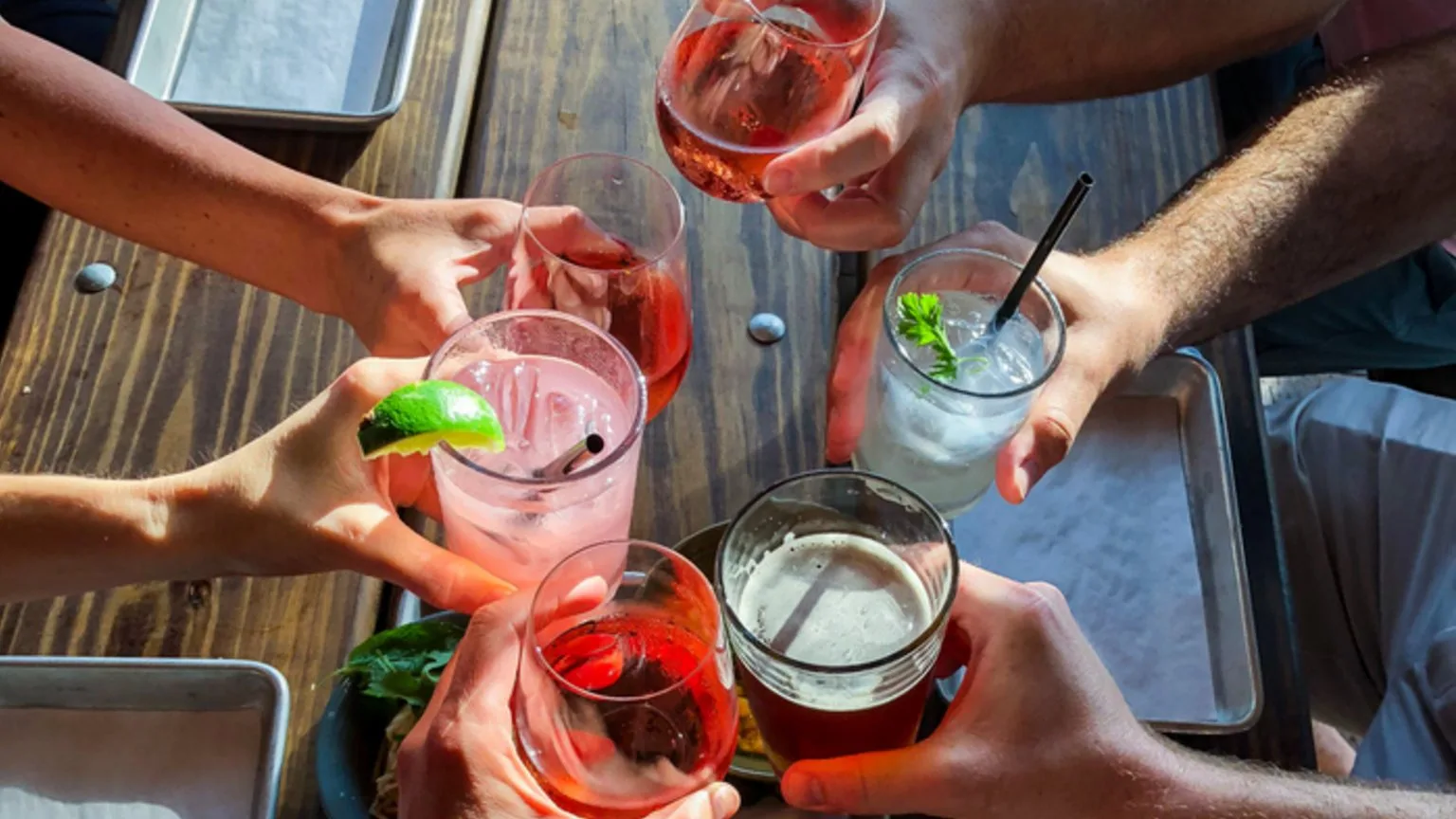 Image: Getty Images People with drinks