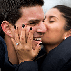 Image: Getty Images Couple with an engagement ring
