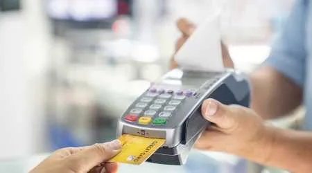 Man making a credit card purchase