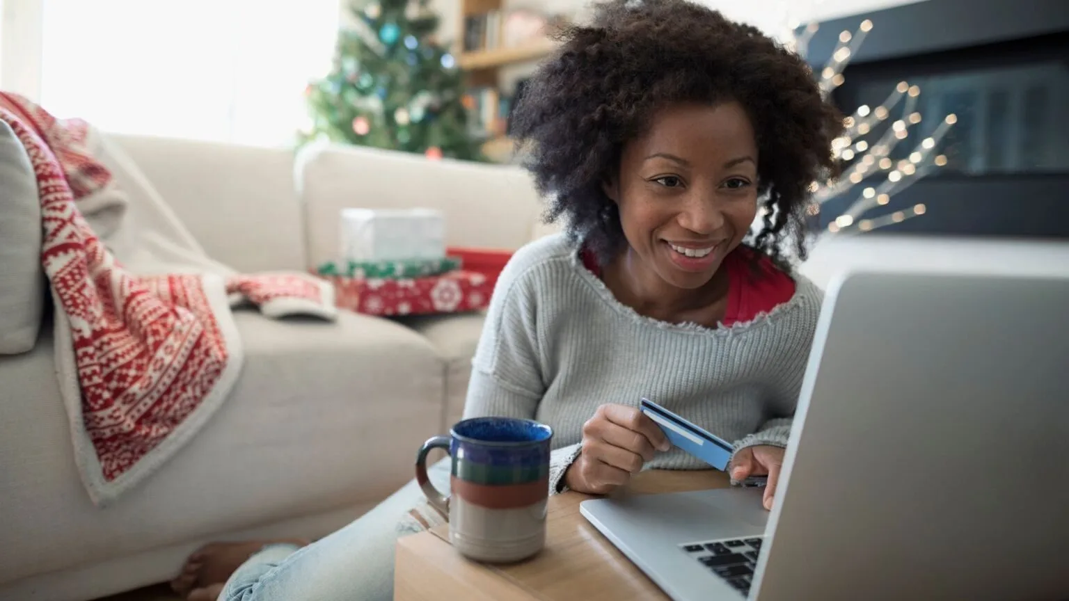Image: Getty Images Woman doing an international money transfer
