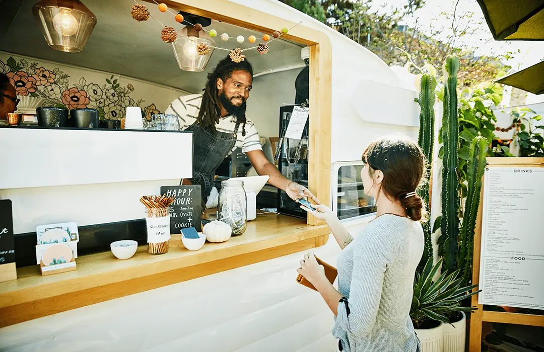 Image: Getty Images Businessman and customer