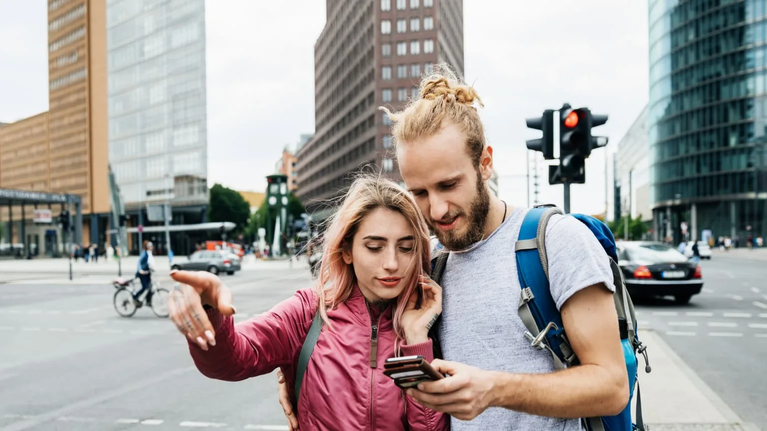 Image: Getty Images couple looking at prepaid phone map for direction