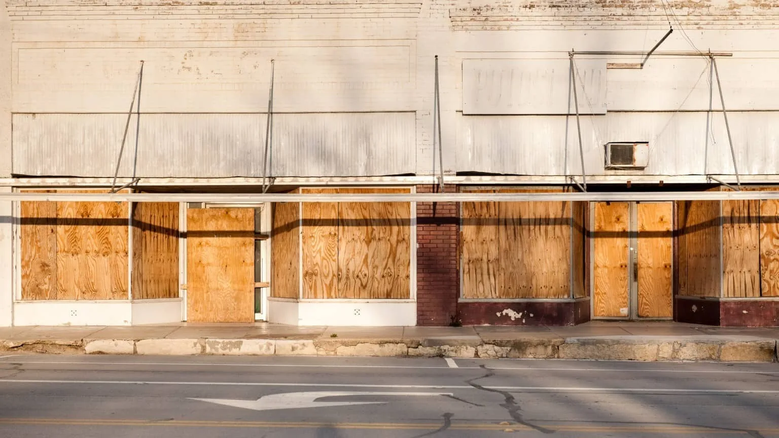 Image: Getty Images businesses whose windows are boarded up