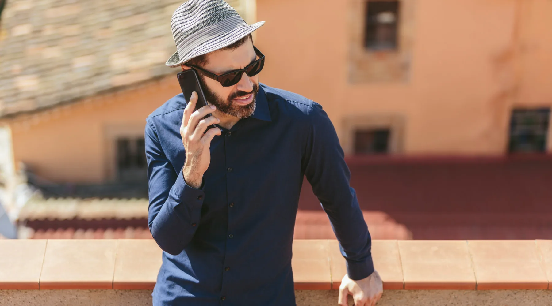 YoungManSpeaksOnPhone_GettyImages_1800x1000 YoungManSpeaksOnPhone_GettyImages_1800x1000