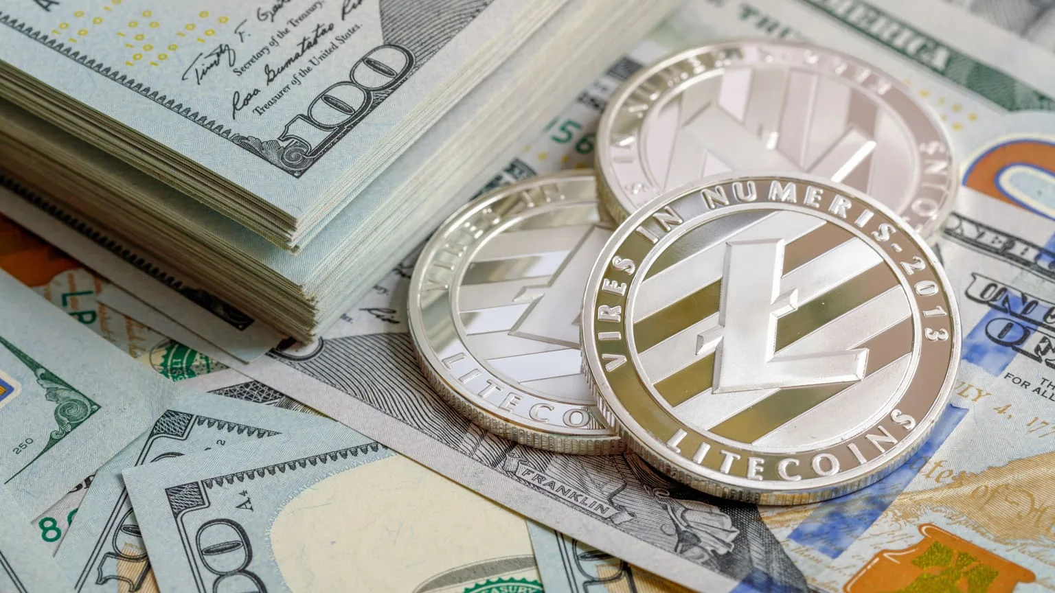 Image: Getty Images Litecoin on top of US dollars