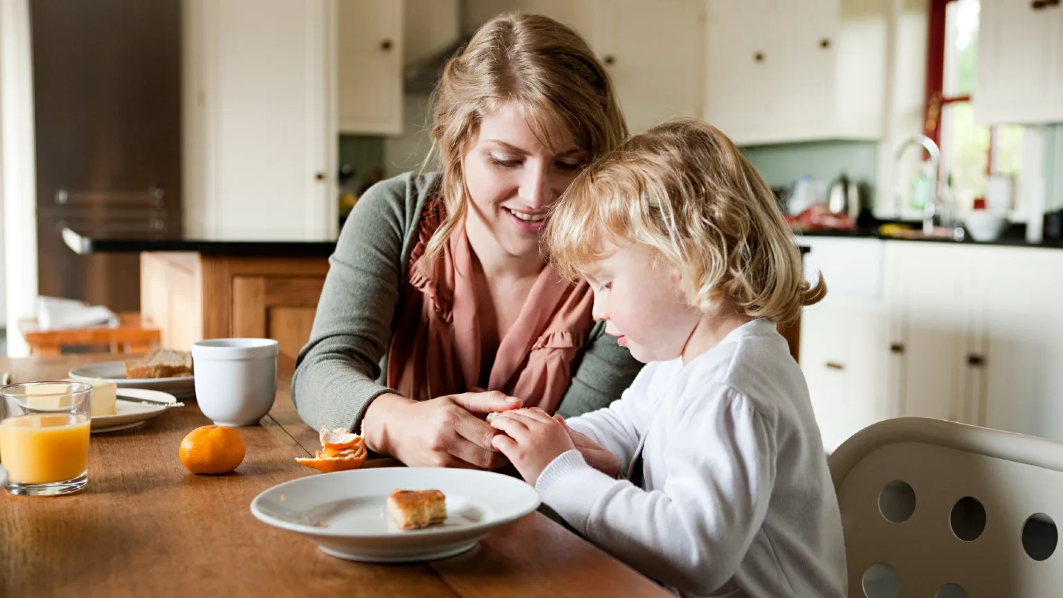 Image: Getty Images Woman and child at home.