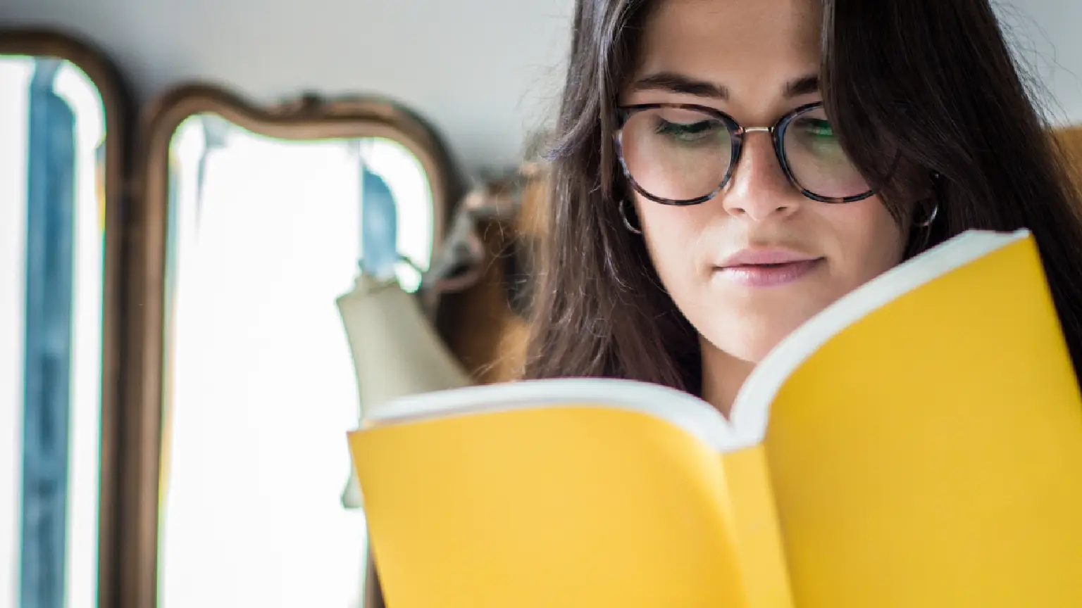 Image: Getty Images woman reading a book