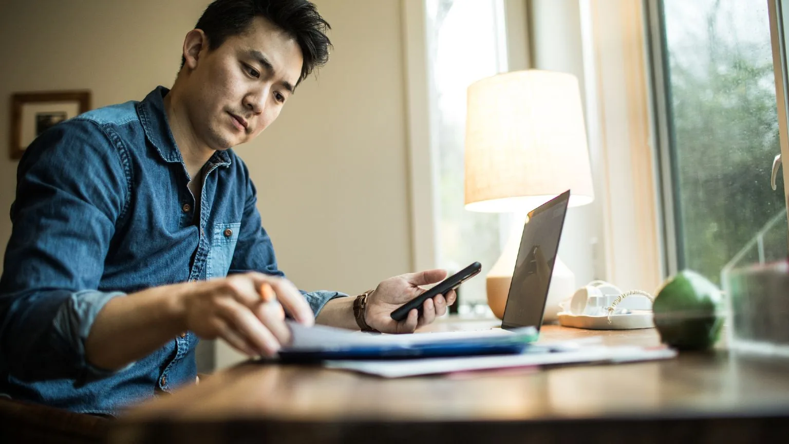 Image: Getty Images Saving Account Man Laptop