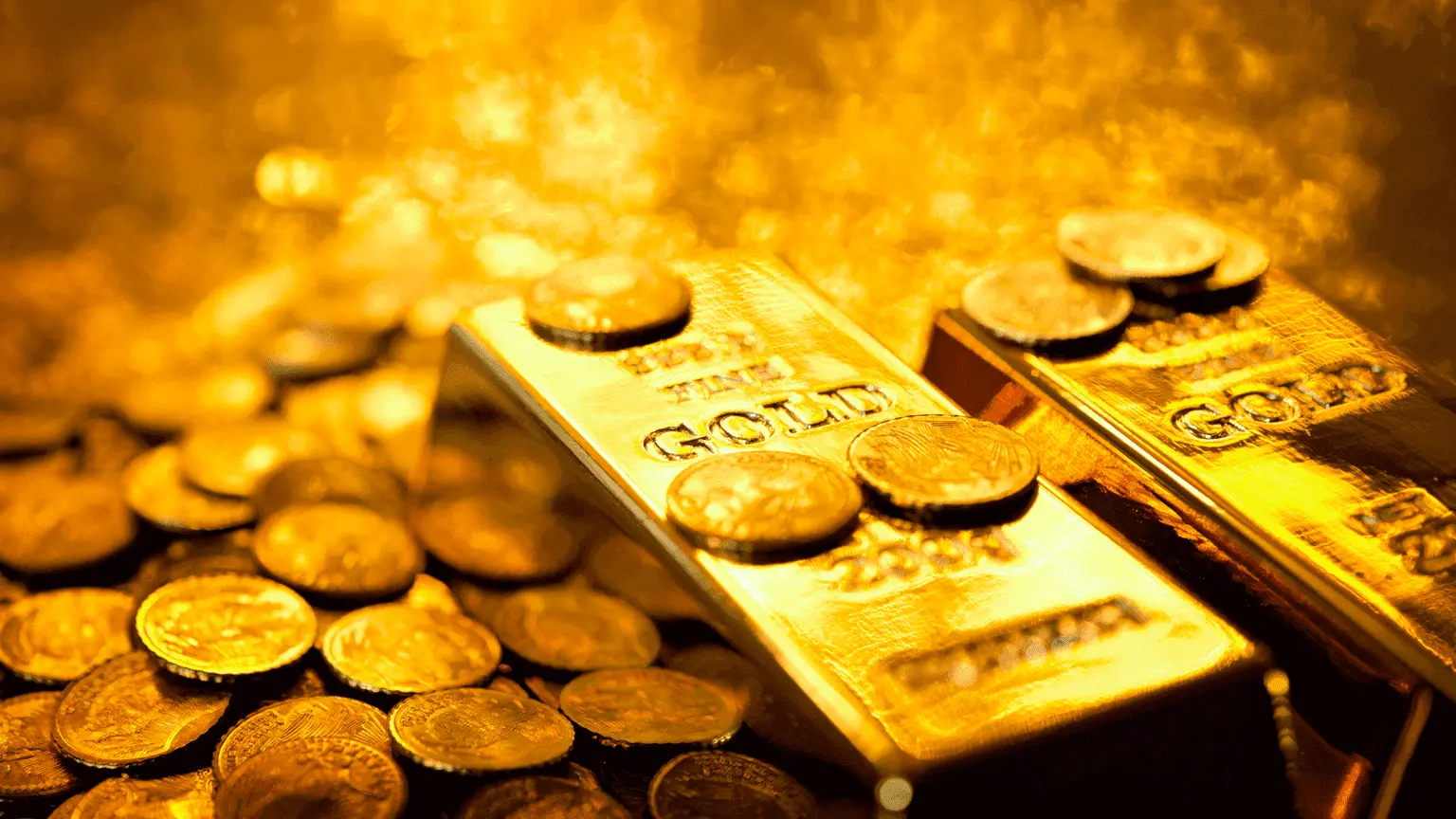 Image: Getty Images Gold bars and coins