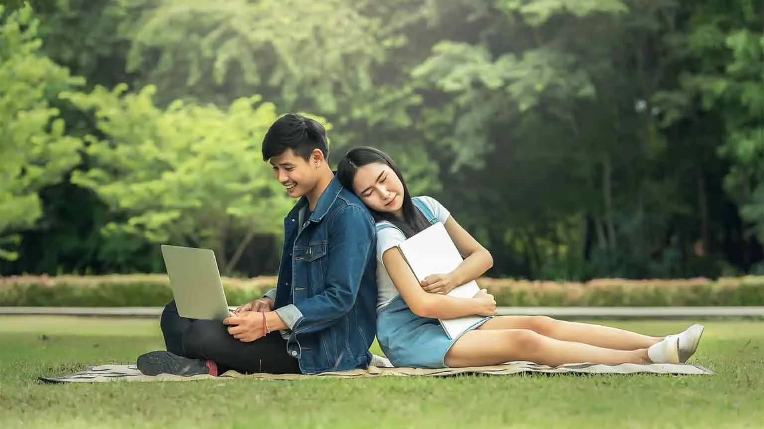 Filipino couple hanging out at the park